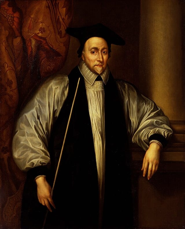 Half-portrait painting of a man leaning against a mantle. He is middle-aged and has a grey goatee. He is wearing a black hat and black robes over a large, puffy, silk tunic with collar.