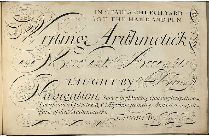 Page from an old book with lines of elegant, cursive writing in ink.